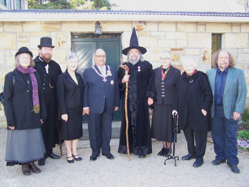 wizard of new zealand posing with other dignitaries