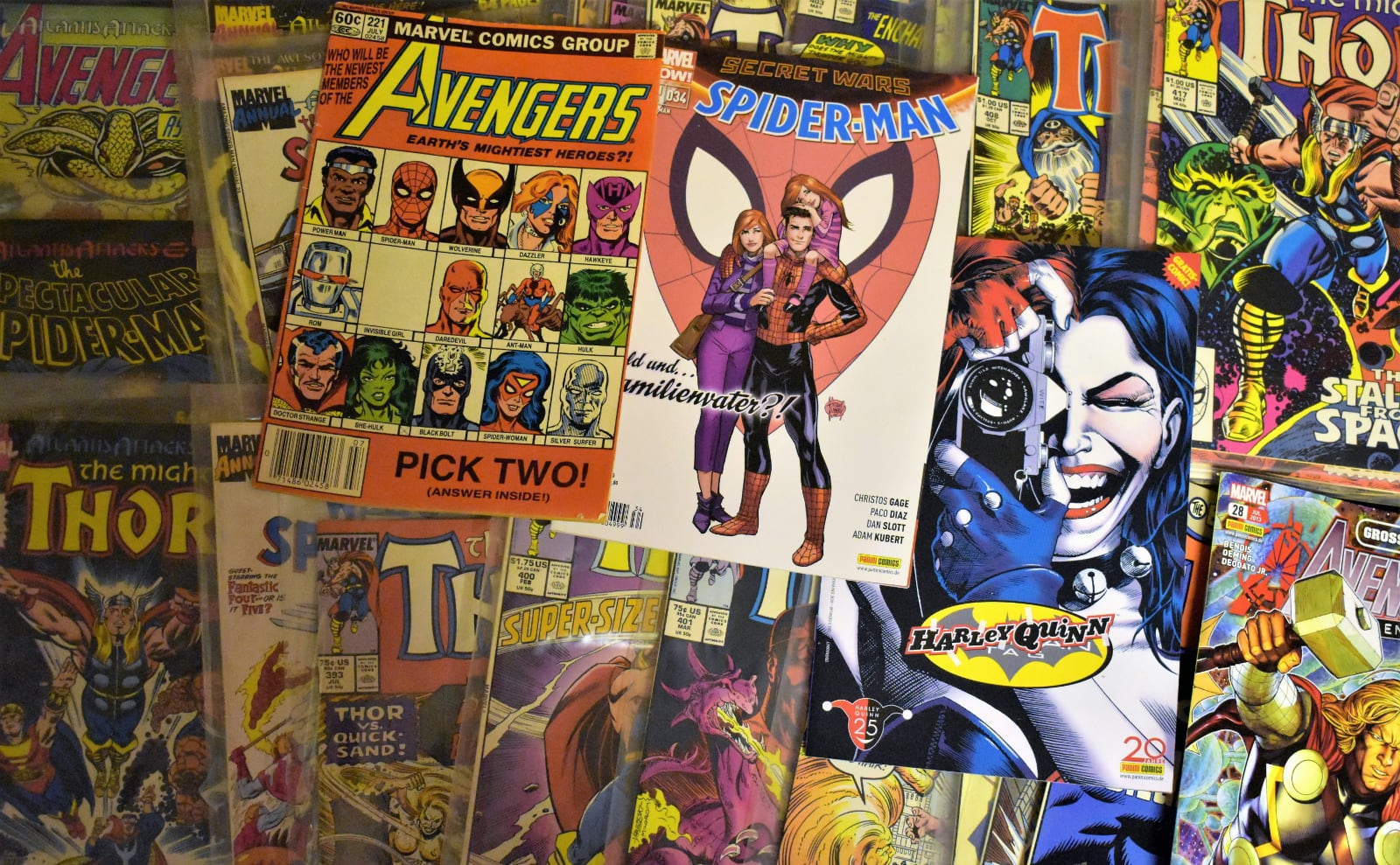 close up of many comic books lying on a table