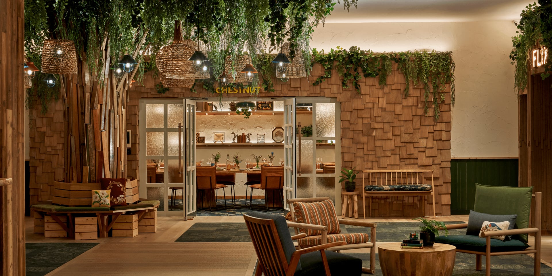 hotel lobby with couches and plants