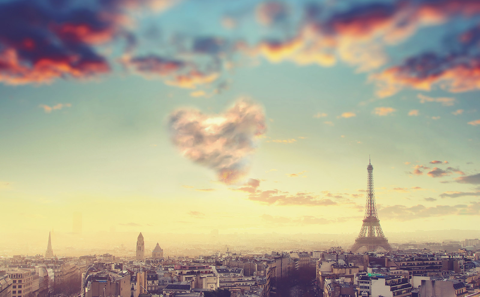 clouds in the sky over the eiffel tower in paris