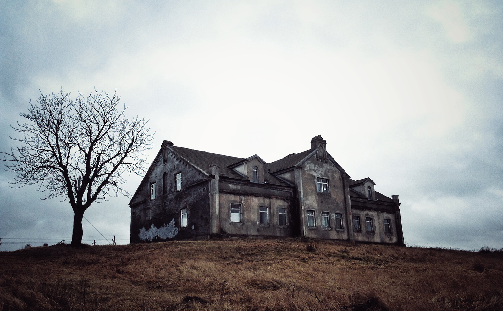 haunted house on a hilltop