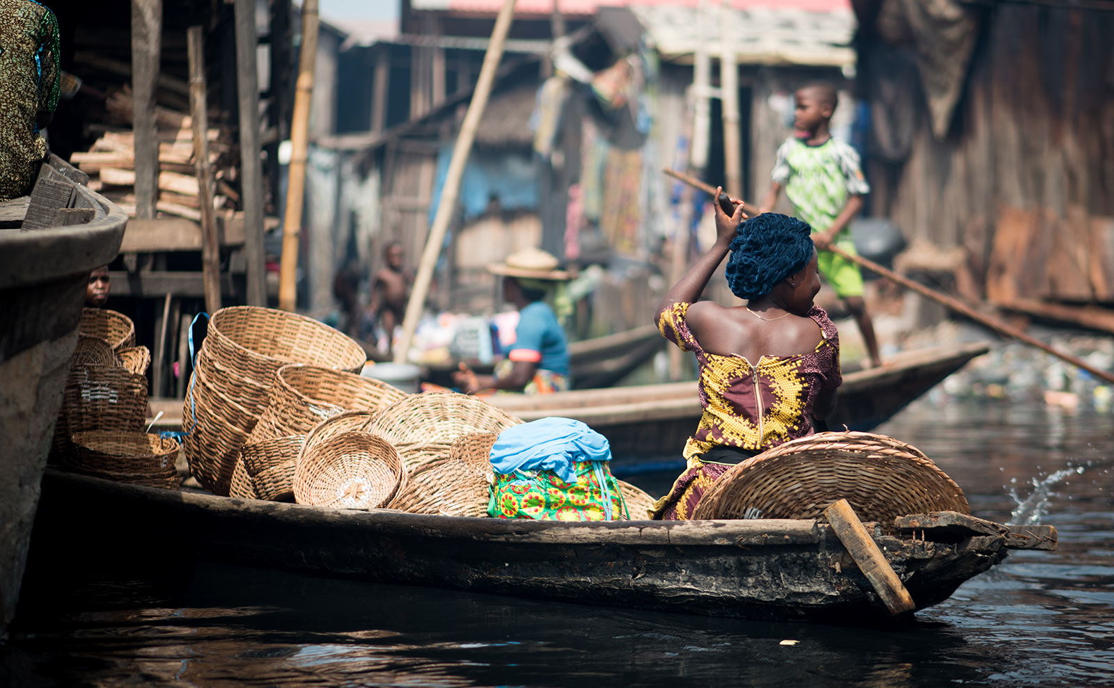 woman in a kayak in the waters of nigeria