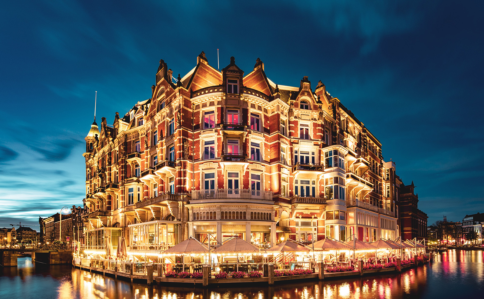 pink hotel lit up at night