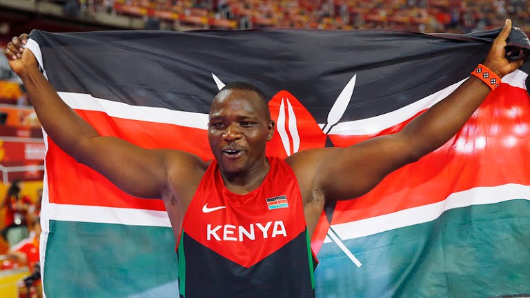  photo of javelin thrower julius yego with kenyan flag