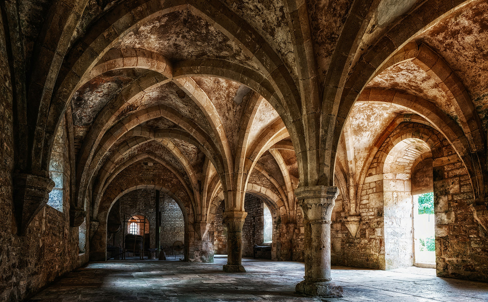 vaulted sandstone hallway of the abbey