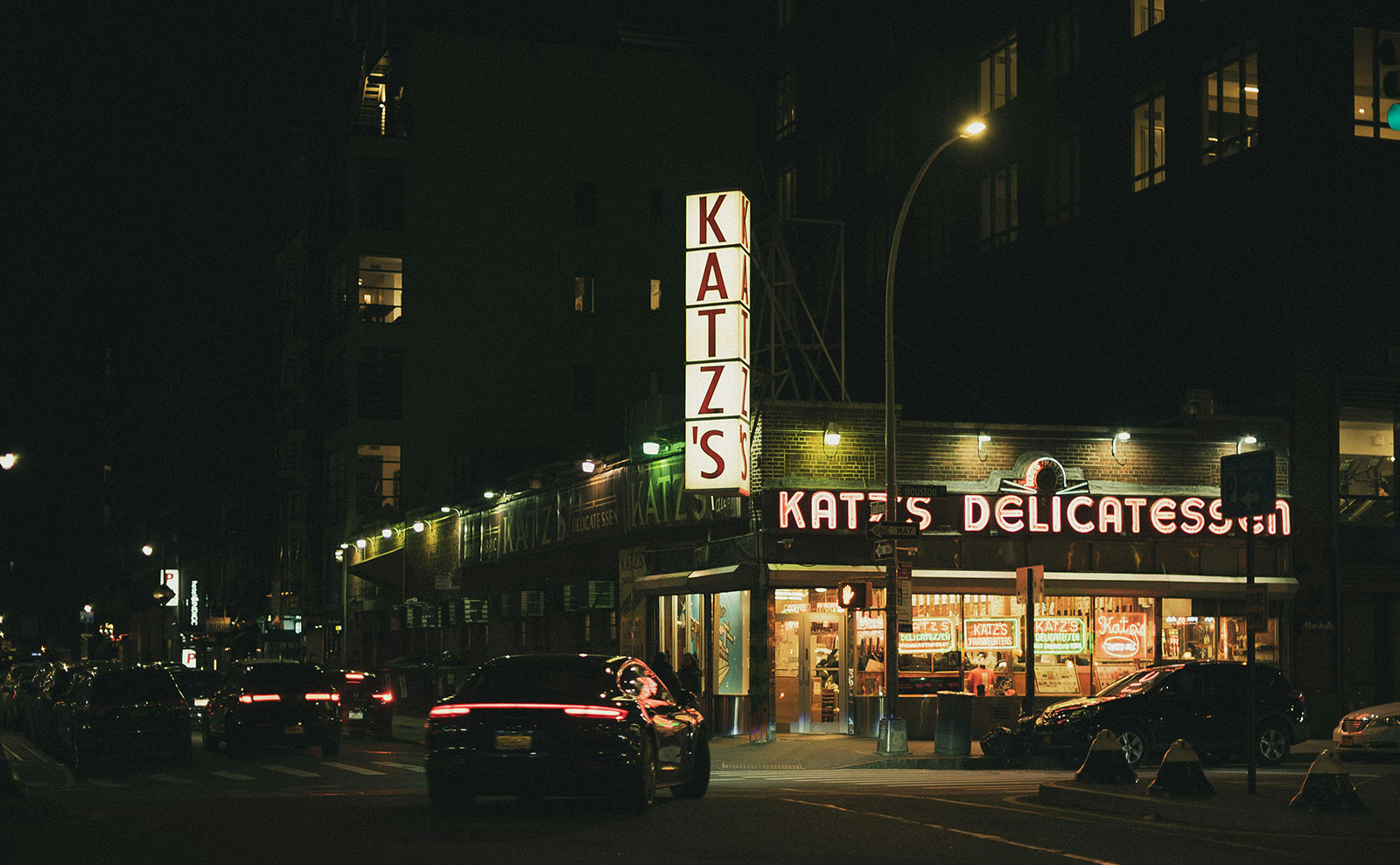 katz's deli with neon signs at night