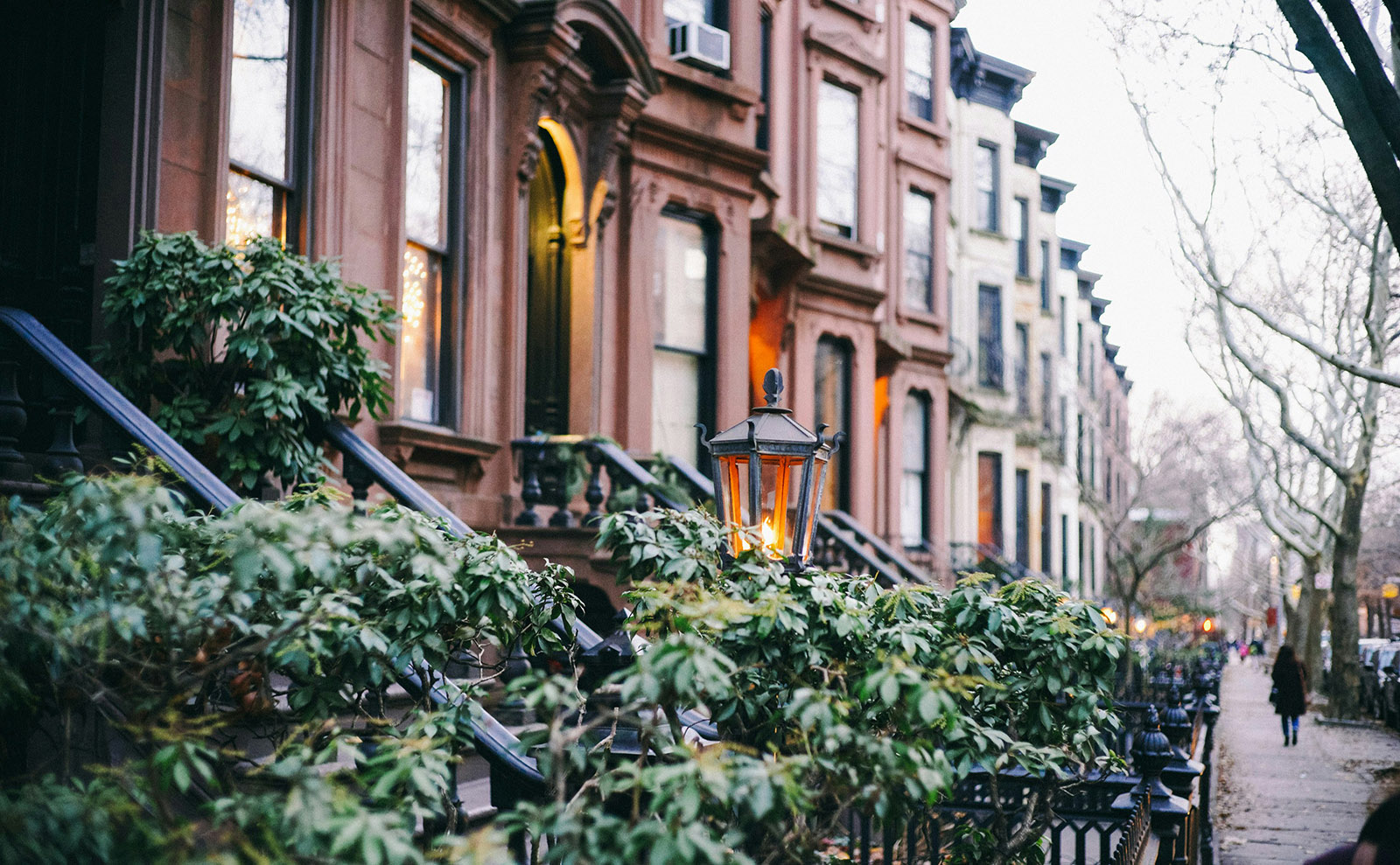 a row of brownstone houses in brooklyn