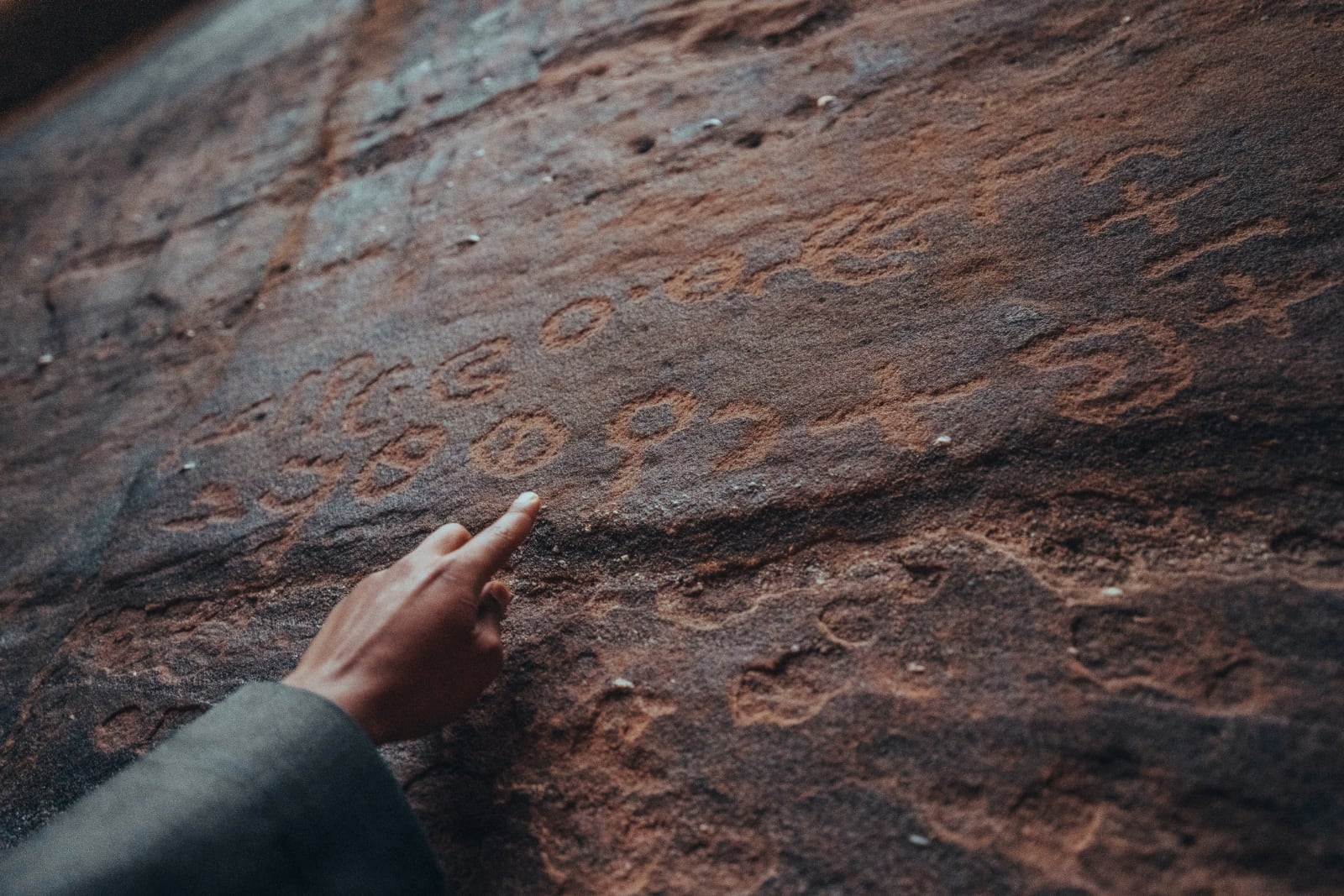 rocks carved with words in ancient languages