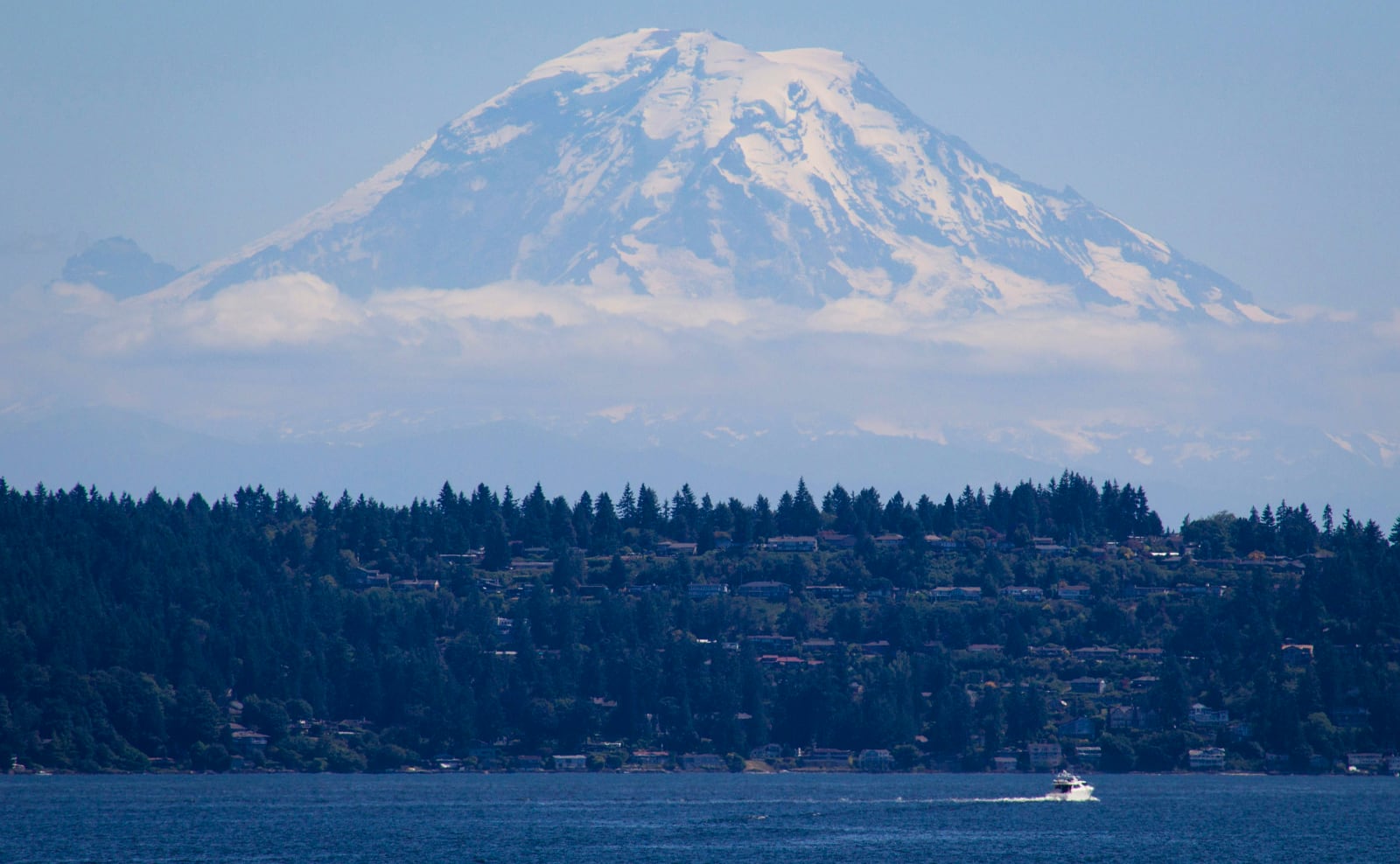 snow-capped mountain surrounded by clouds