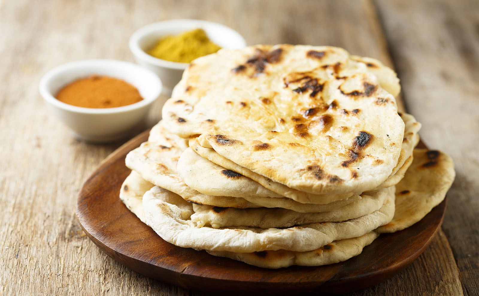 pieces on naan bread in a basket