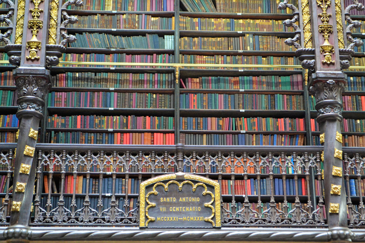 gilt-edged bookshelves in the royal portuguese reading room