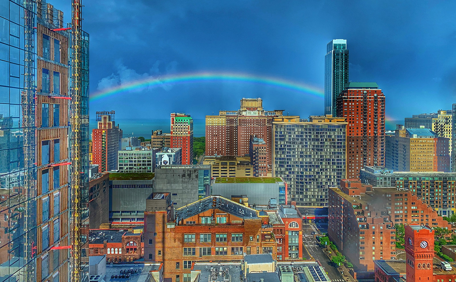 colorful chicago skyline with a rainbow