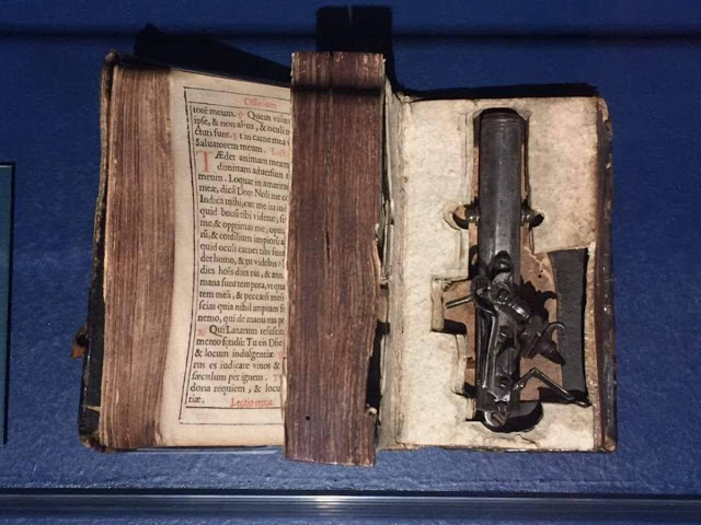  bible fitted with a gun inside