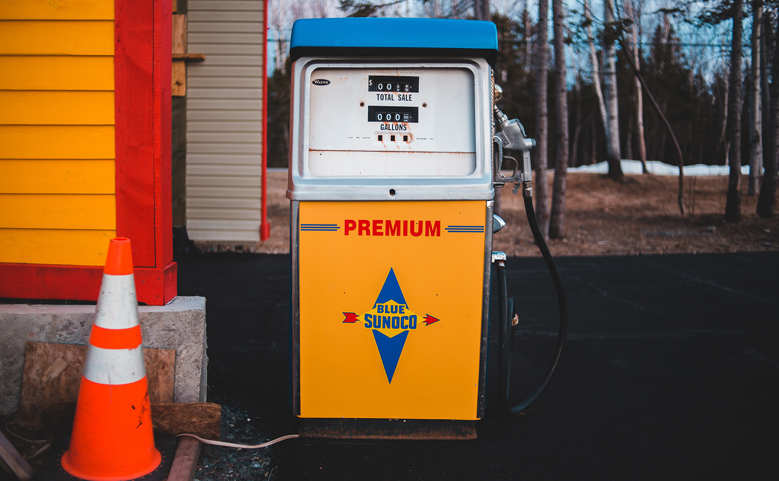vintage gas pump at a rural gas station