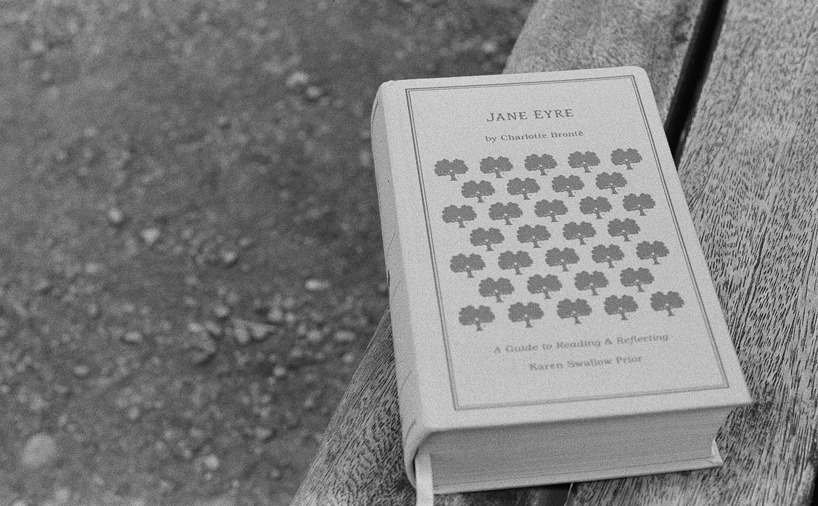  a hardcover copy of the novel jane eyre on a gray background