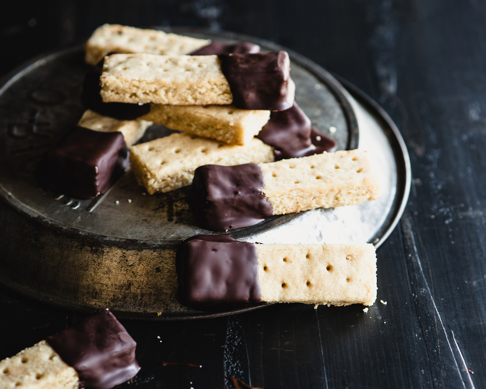 stack of shortbread cookies dipped in chocolate