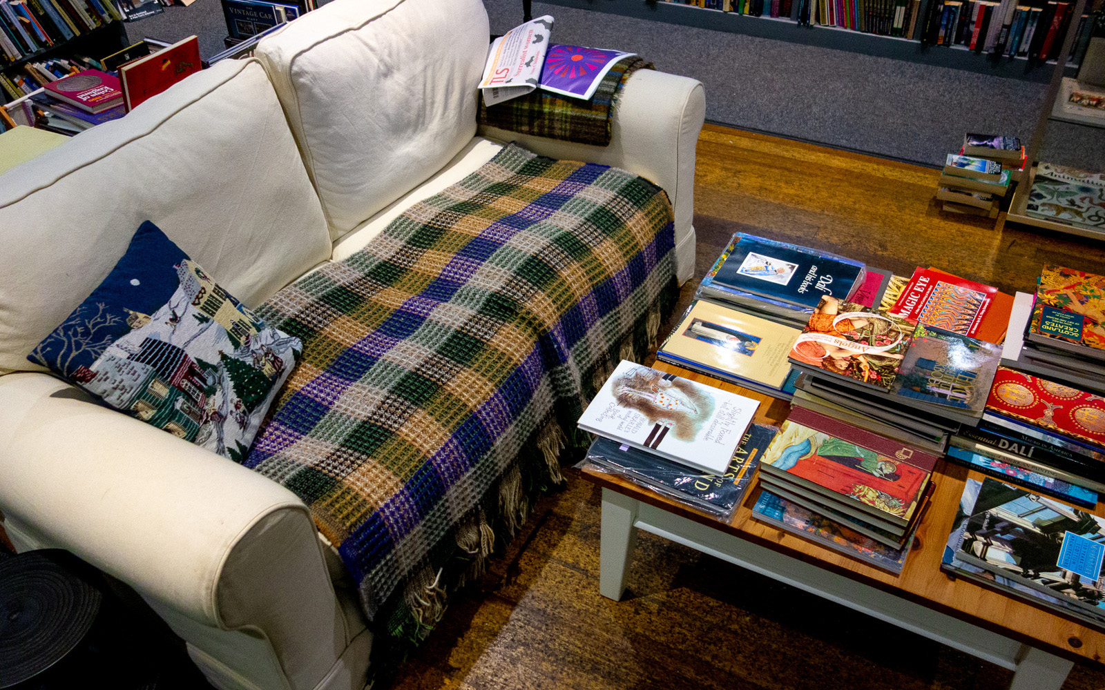 couch and a table of books