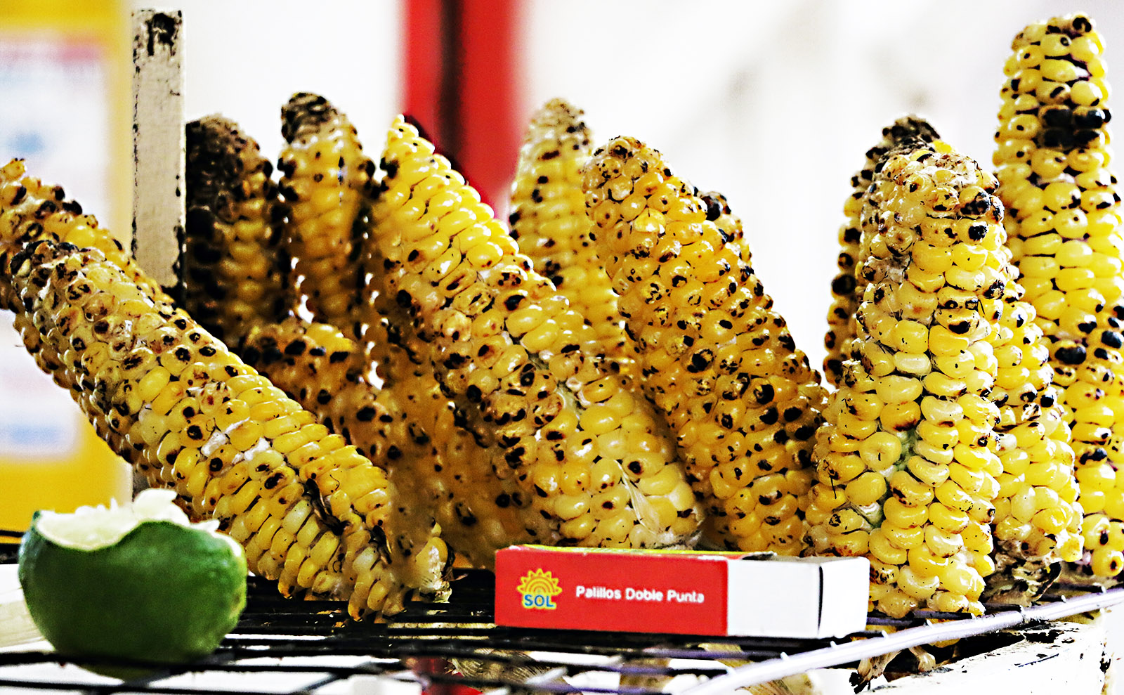 basket of grilled corn on the cob